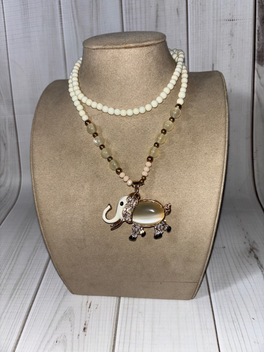 Cream Beaded Necklace with Gold Elephant Pendant